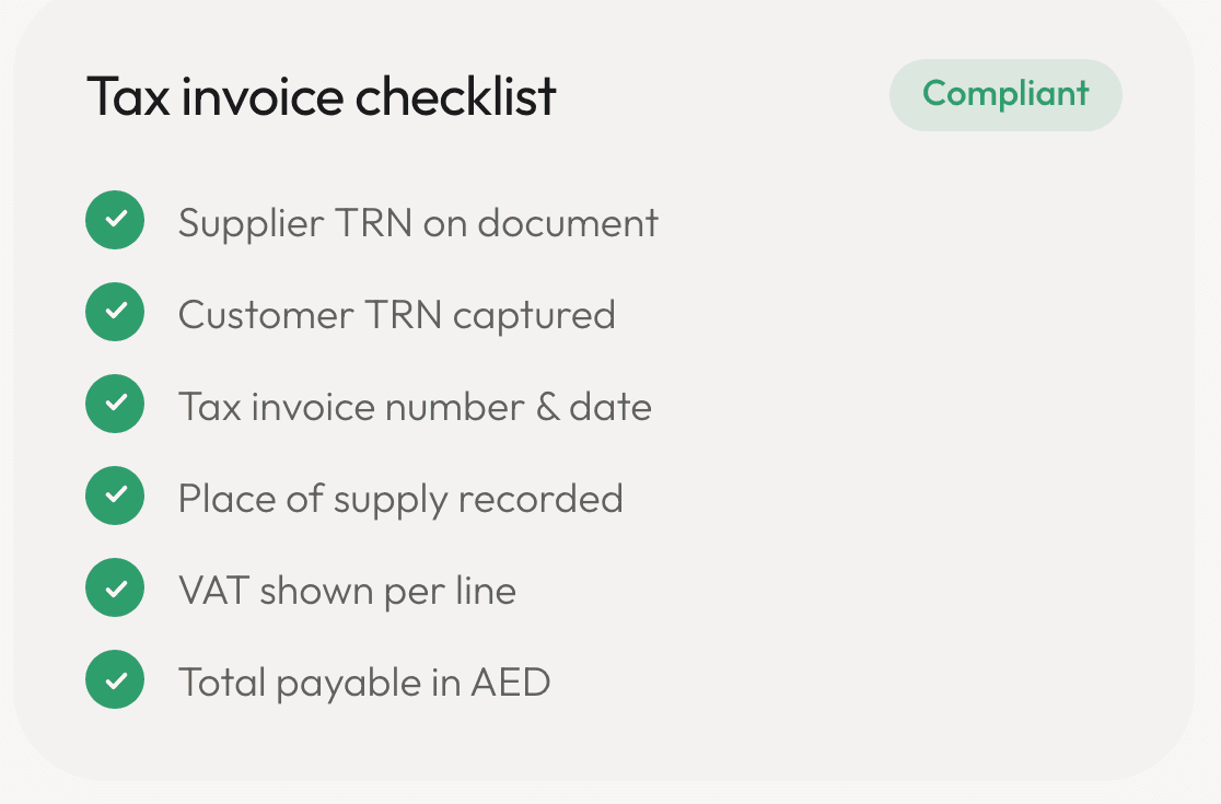A tax invoice checklist marked compliant — supplier TRN, customer TRN, number and date, place of supply, per-line VAT.